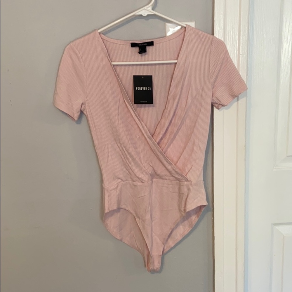 Same as pictured yellow bodysuit